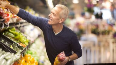 senior man goes grocery shopping royalty free image 1671747031